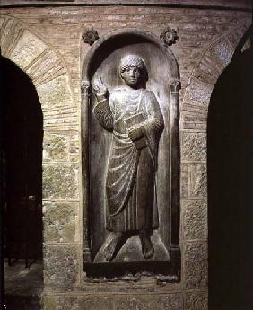 Relief of a man dressed in a toga holding a bookfrom the ambulatory 11th centu