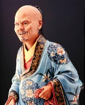 A seated nodding figure of a man Qianlong p
