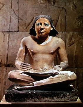 Scribe seated cross-legged holding a papyrus scroll, from Saqqara, Old Kingdom c.2475 BC Old Kingdo