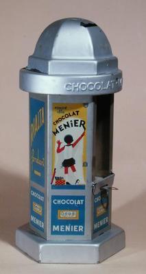 Toy Moneybox advertising the chocolate 'Menier' delivering chocolate to the children, c.1930 (tin) 1826