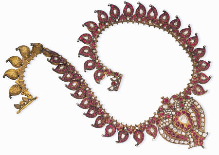 An Indian Ruby And Diamond Necklace With a Centre-Piece Designed As A Double-Peacock and Set With Ta von 