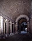 The atrium, with red granite columns and a coffered barrel vaulted ceiling, designed by Antonio da S 1909