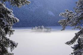 fog over frozen lake