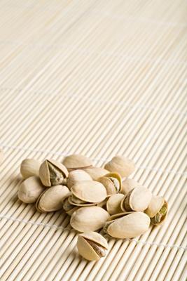 pistachios on bamboo